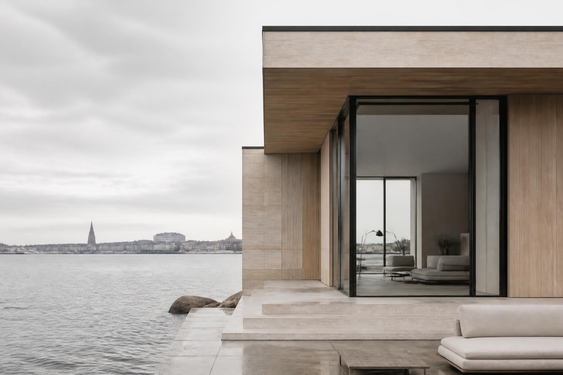 Contemporary limestone and timber house at the water's edge, facing Copenhagen